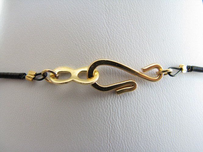 Hook and eye clasp close-up